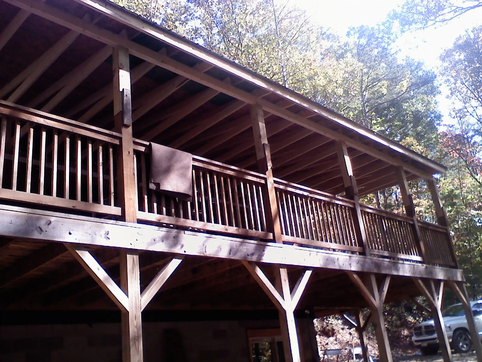 Timber framing under a new elevated porch and deck — Roof Leak Repair in Mars Hill by Roofing Brothers